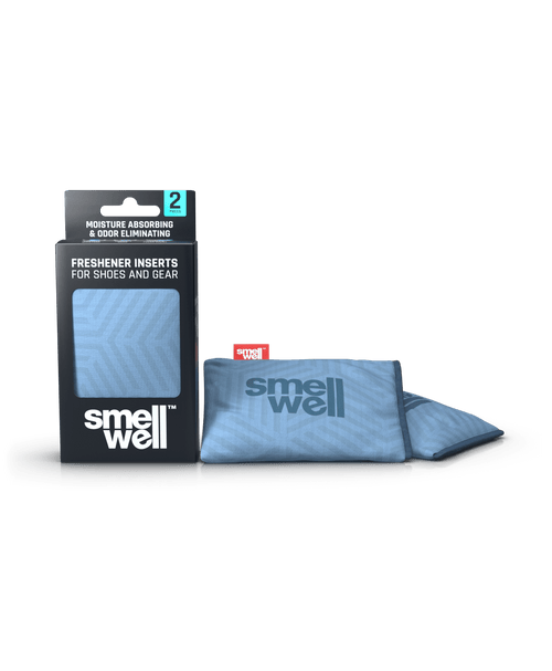A package of SmellWell Active - Geometric Grey and 2 SmellWell Active - Geometric Grey freshener inserts bags next to it