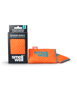 A package of SmellWell Active - Geometric Orange and 2 SmellWell Active - Geometric Orange freshener inserts bags next to it