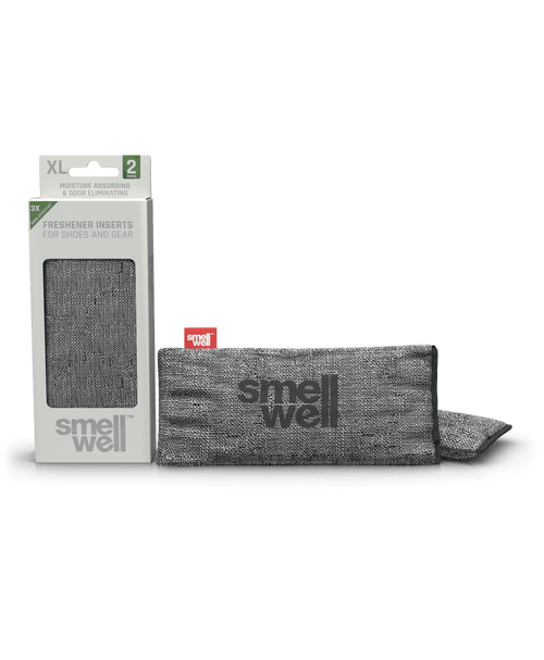 A package of SmellWell Sensitive XL - Grey and 2 SmellWell Sensitive XL - Grey freshener inserts bags next to it